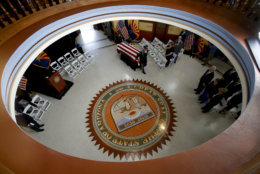 The Arizona National Guard moves the casket into the museum rotunda during a memorial service for Sen. John McCain, R-Ariz. at the Arizona Capitol on Wednesday, Aug. 29, 2018, in Phoenix. (AP Photo/Ross D. Franklin, Pool)