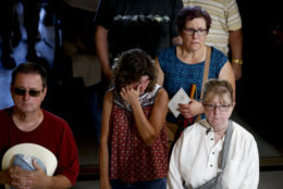 Members of the public line up to pay their respects for Sen. John McCain during a viewing at the Arizona Capitol on Wednesday, Aug. 29, 2018, in Phoenix. (AP Photo/Ross D. Franklin)