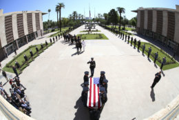 The Arizona National Guard carries the casket of Sen. John McCain, R-Ariz. during memorial service at the Arizona Capitol on Wednesday, Aug. 29, 2018, in Phoenix .(Rob Schumacher/The Arizona Republic via AP, Pool)