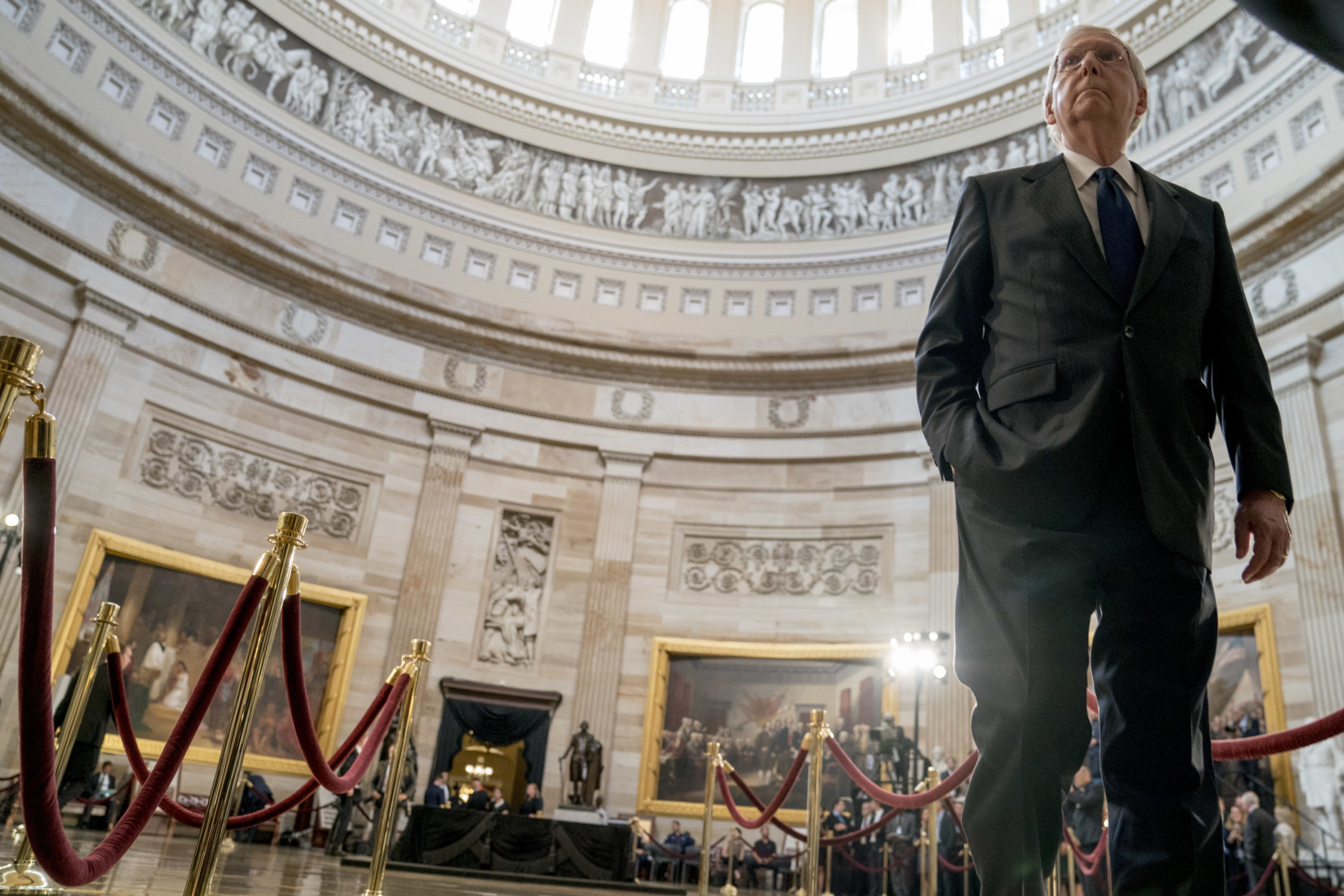 Senate Majority Leader Mitch McConnell of Ky., walks through the Rotunda before the casket of Sen. John McCain, R-Ariz., lies in state at the U.S. Capitol, Friday, Aug. 31, 2018, in Washington. (AP Photo/Andrew Harnik, Pool)