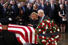 Former Connecticut Sen. Joe Lieberman and his wife Hadassah touch the casket of Sen. John McCain, R-Ariz., as he lies in state at the U.S. Capitol Rotunda on Friday, Aug. 31, 2018. (Kevin Lamarque/Pool Photo via AP)