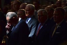 Sen. Chuck Schumer, D-N.Y., left, attends a ceremony for Sen. John McCain, R-Ariz., as he lies in state in the Rotunda at the U.S. Capitol, in Washington, Friday, Aug. 31, 2018. (Kevin Dietsch/Pool Photo via AP)
