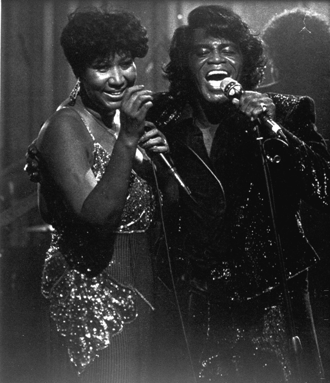 Singers James Brown and Aretha Franklin perform at the Taboo night club in Detroit Saturday night, Jan. 11, 1987, for a show which was taped for airing on HBO.   (AP Photo/Joe Kennedy)