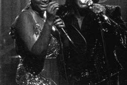 Singers James Brown and Aretha Franklin perform at the Taboo night club in Detroit Saturday night, Jan. 11, 1987, for a show which was taped for airing on HBO.   (AP Photo/Joe Kennedy)