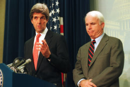 Sen. John Kerry, D-Mass., left, and Sen. John McCain, R-Ariz., meet reporters on Capitol Hill in Washington, D.C., Jan. 27, 1994, after the Senate voted to urge the Clinton administration to lift the 19-year-old trade embargo against Vietnam.  (AP Photo/John Duricka)