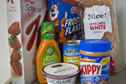 Foods that might have added sugar or another sweetener like high-fructose corn syrup as an ingredient are pictured Wednesday, March 4, 2015, in New York. New guidelines published by the World Health Organization on Wednesday say the world is eating too much sugar and people should slash their sugar intake to just 5 to 10 percent of their overall calories. (AP Photo/Bebeto Matthews)