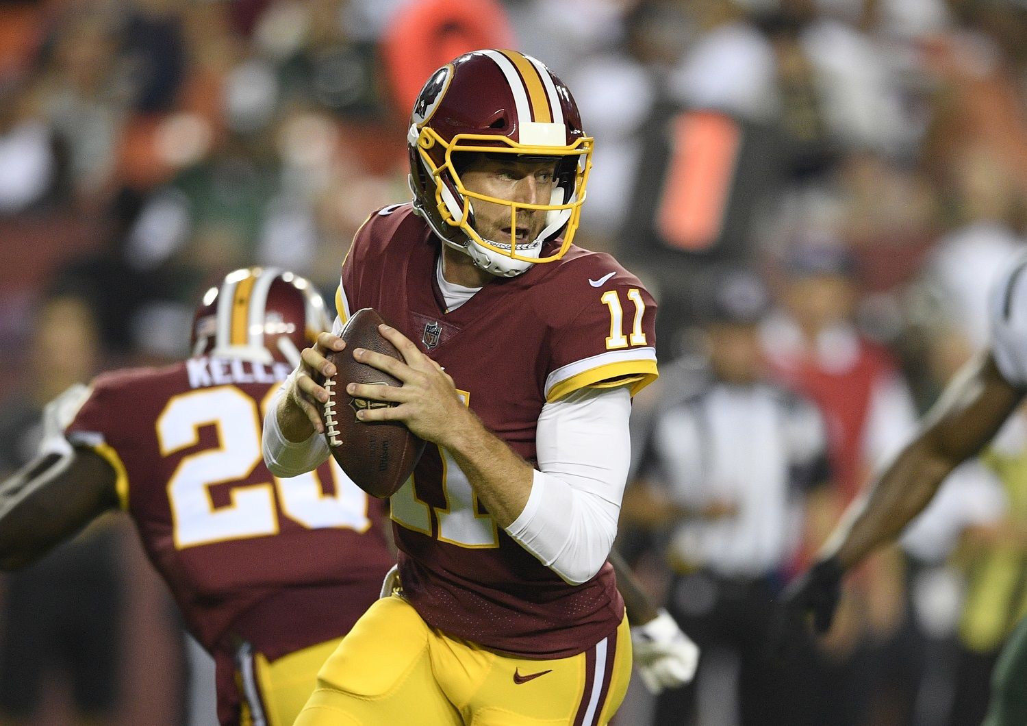 Washington Redskins quarterback Alex Smith (11) looks to pass during the first half of a preseason NFL football game against the New York Jets, Thursday, Aug. 16, 2018, in Landover, Md. (AP Photo/Nick Wass)