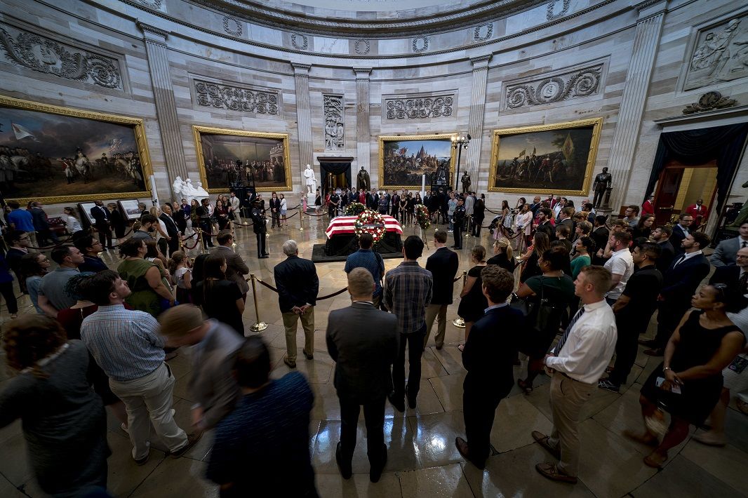 Members of the public pay their respects as Sen. John McCain, R-Ariz., lies in state in the Rotunda of the U.S. Capitol, Friday, Aug. 31, 2018, in Washington. (AP Photo/Andrew Harnik)