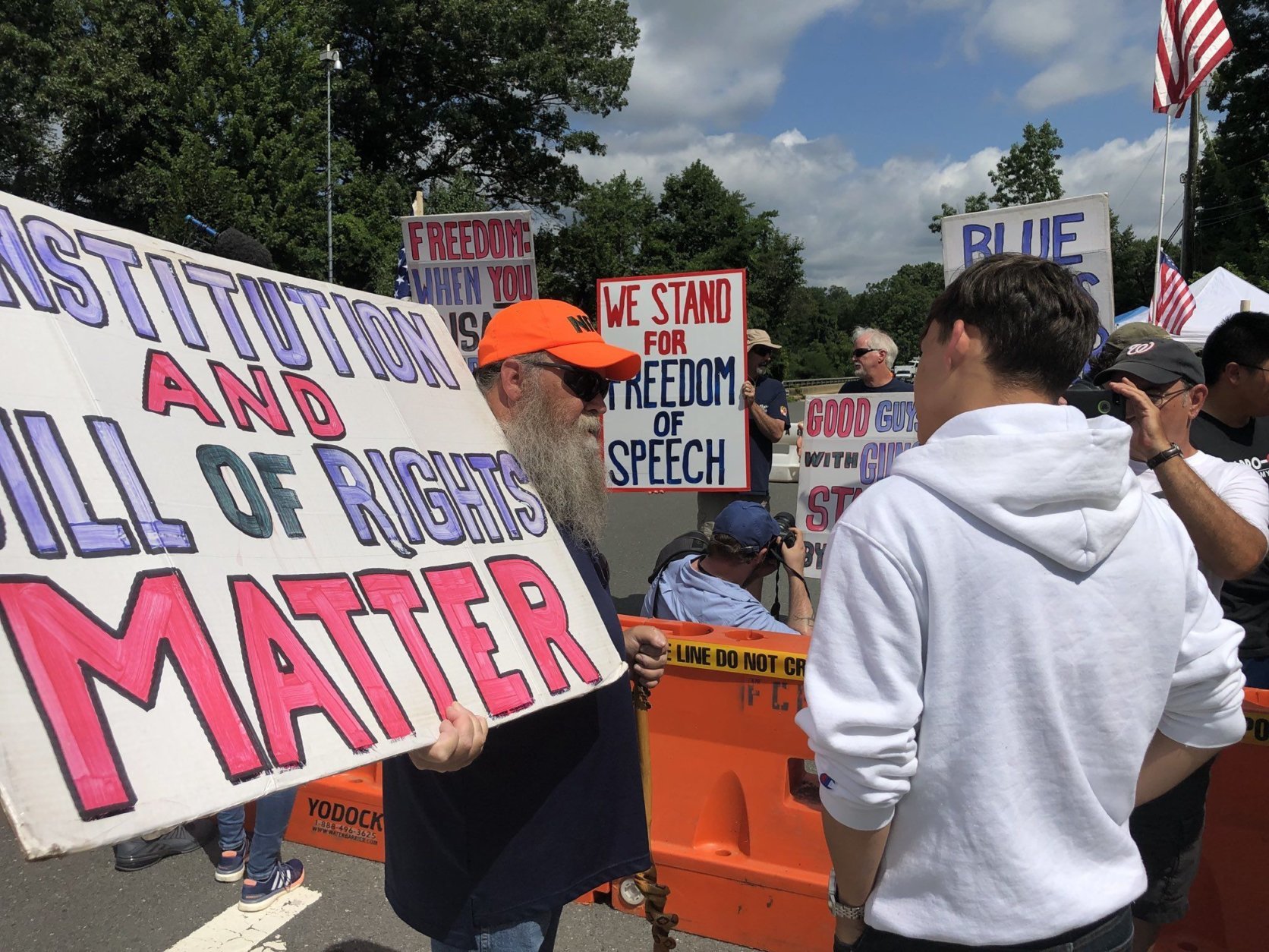 Pro-gun groups stood apart from the main rally on Waples Mill Road. (WTOP/Melissa Howell)