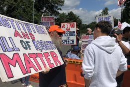 Pro-gun groups stood apart from the main rally on Waples Mill Road. (WTOP/Melissa Howell)