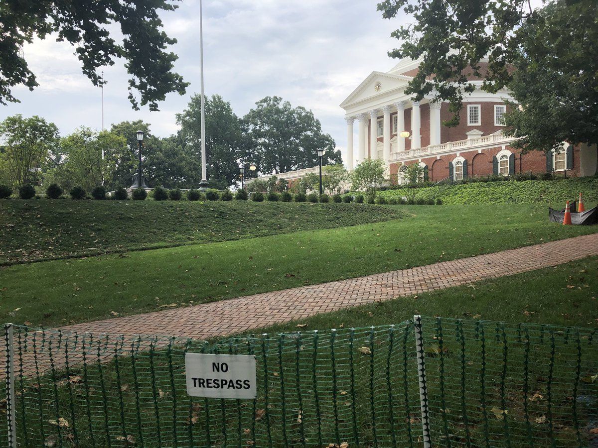 A "No Trespassing" sign surrounds the area by the University of Virginia's rotunda. (WTOP/Max Smith) 