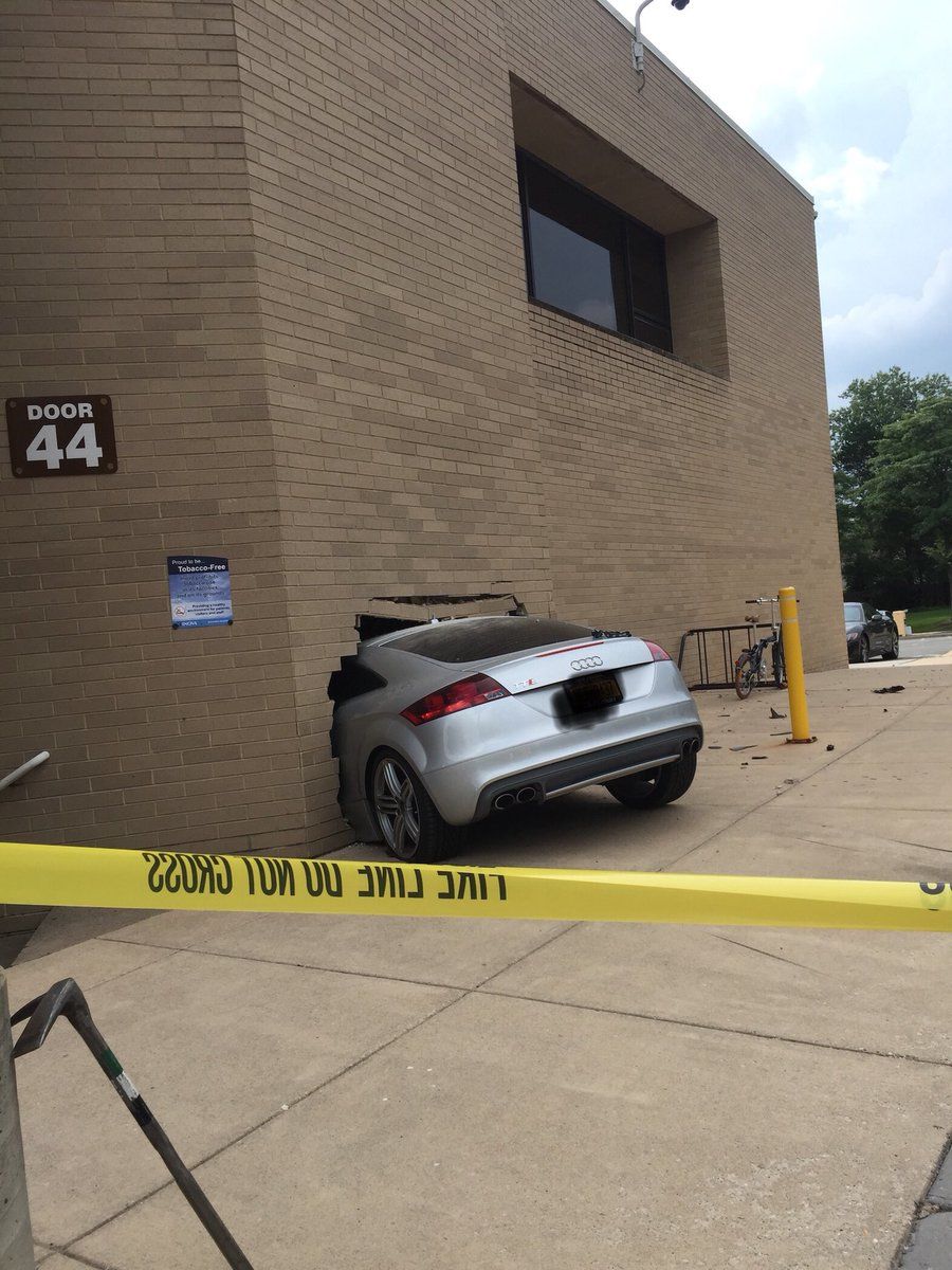 One person is being treated after a car crashed into a wall of Inova Alexandria Hospital Saturday afternoon. (Courtesy Alexandria IAFF) 