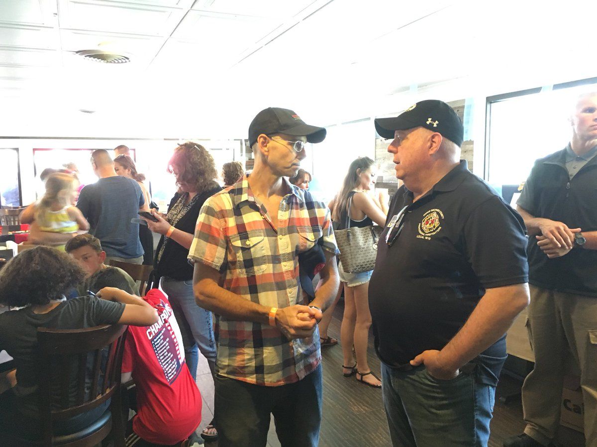 The Pier Oyster Bar and Grill in Edgewater was packed with family, coworkers and many more, including Gov. Larry Hogan. (WTOP/Liz Anderson) 