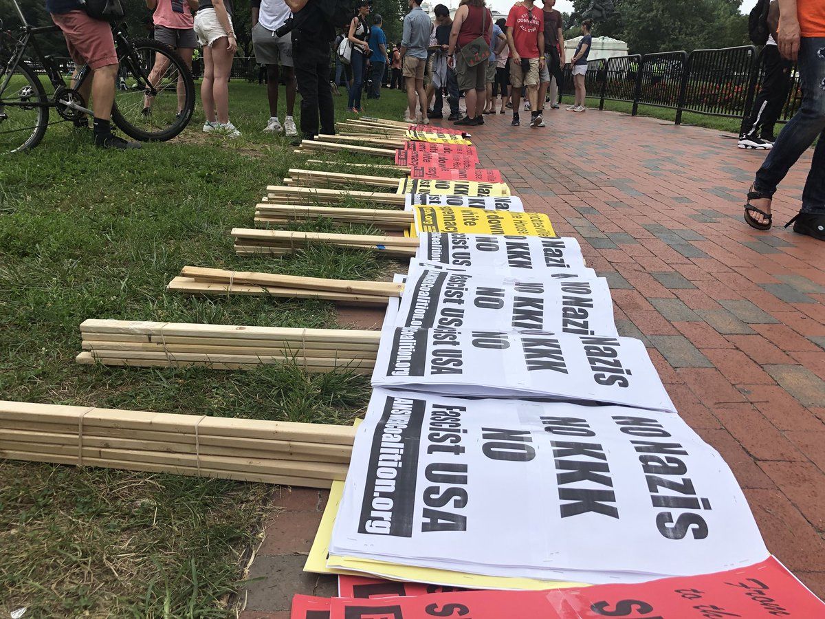 Huge crowds gather for the ANSWER Coalition protest Sunday at Lafayette Park. ( WTOP/Melissa Howell)