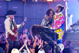 NEW YORK, NY - AUGUST 20:  (L-R) Brad Whitford, Joe Perry, and Steven Tyler of Aerosmith perform with Post Malone onstage during the 2018 MTV Video Music Awards at Radio City Music Hall on August 20, 2018 in New York City.  (Photo by Michael Loccisano/Getty Images for MTV)