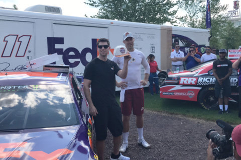 NASCAR’s Hamlin watches Redskins practice, meets with Smith