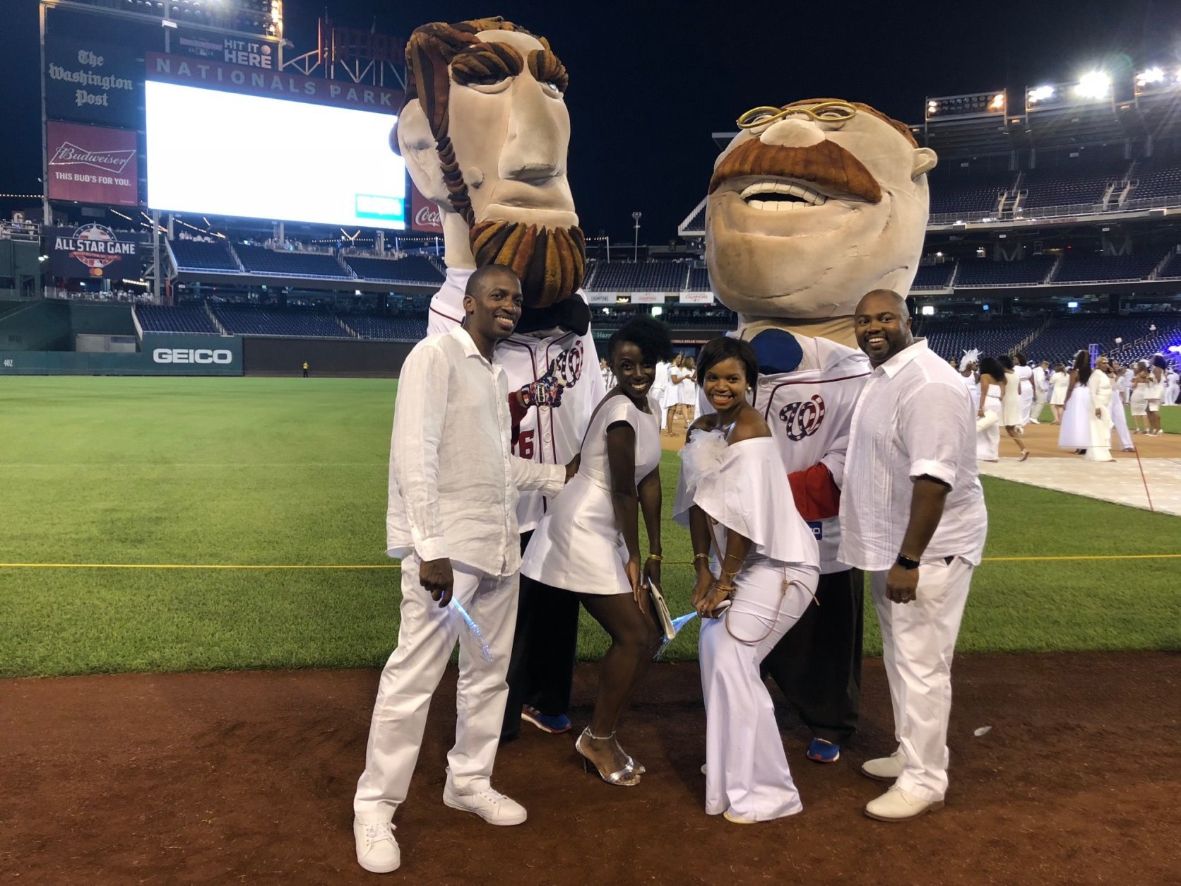The fifth edition of Diner en Blanc, the white clothing-only pop-up dinner party took over Nats Park on Saturday, August 25. Abe and Teddy wore their white jerseys, of course.