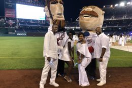 The fifth edition of Diner en Blanc, the white clothing-only pop-up dinner party took over Nats Park on Saturday, August 25. Abe and Teddy wore their white jerseys, of course.
