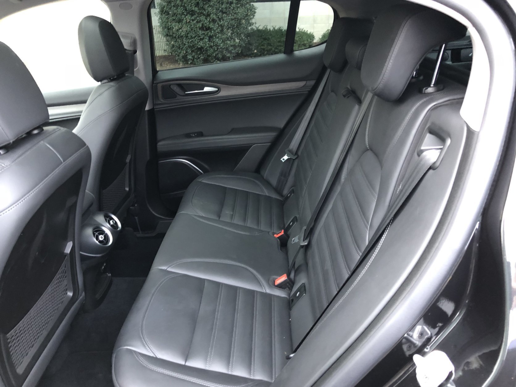 The interior of the Stelvio Ti Lusso is mostly a hit, with seating for five. (WTOP/Mike Parris)