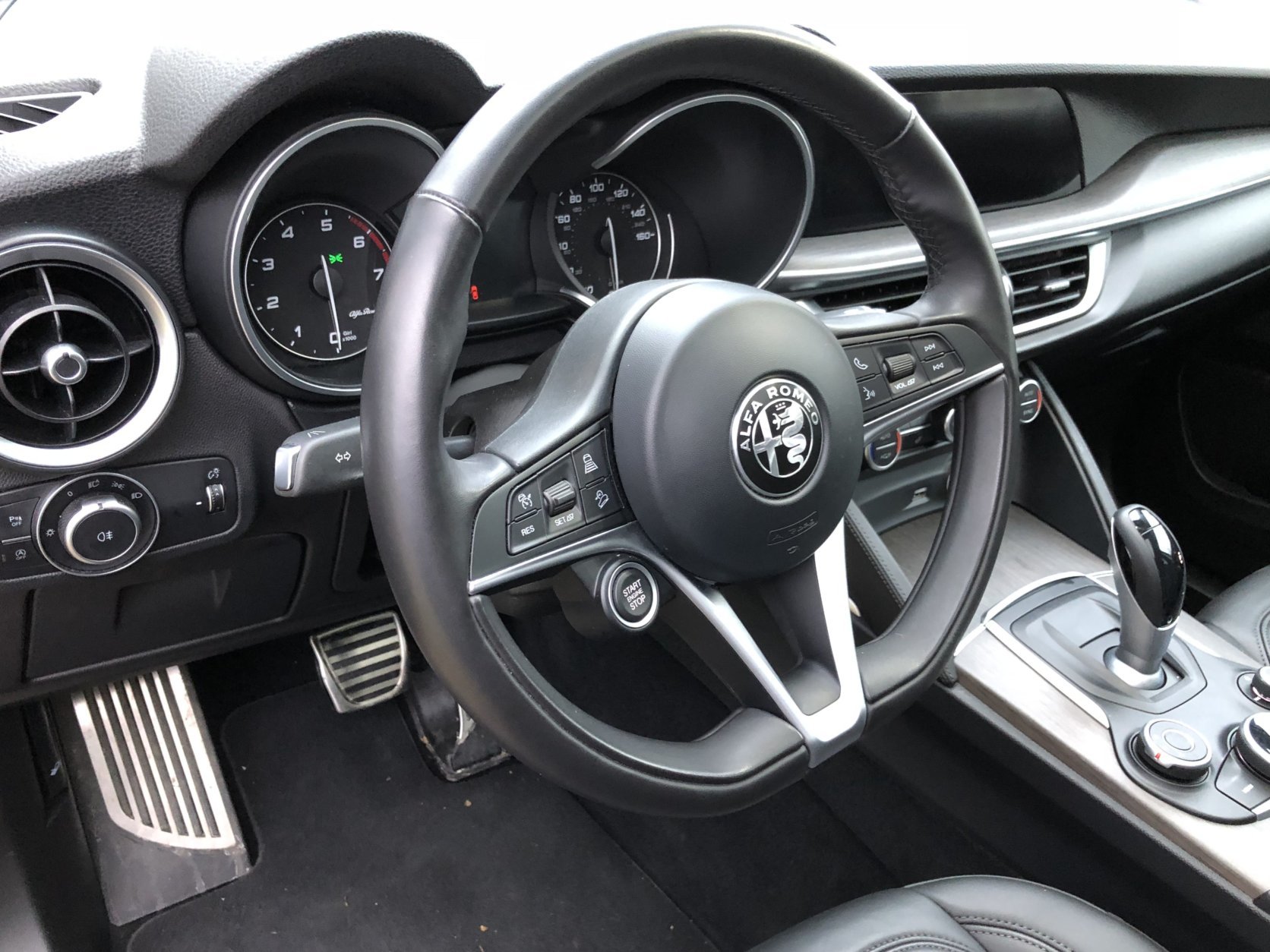 The driver is welcomed by a nice heated leather steering wheel with the start button on the wheel,. (WTOP/Mike Parris)