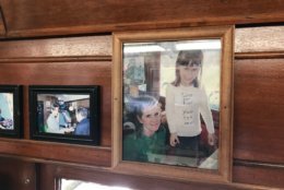 Dana Gerber, her 18-year old daughter, has a picture from when she was just 7 years old, posted on a wood panel above one of the diner's booths. (WTOP/Dick Uliano)