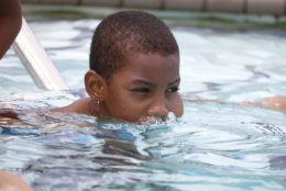 One boy practices breathing before going underwater. (WTOP/Kate Ryan)