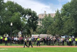 Counterprotesters waiting in Lafayette Square for Unite the Right 2 protesters marching from the Foggy Bottom Metro station. (WTOP/Keara Dowd)