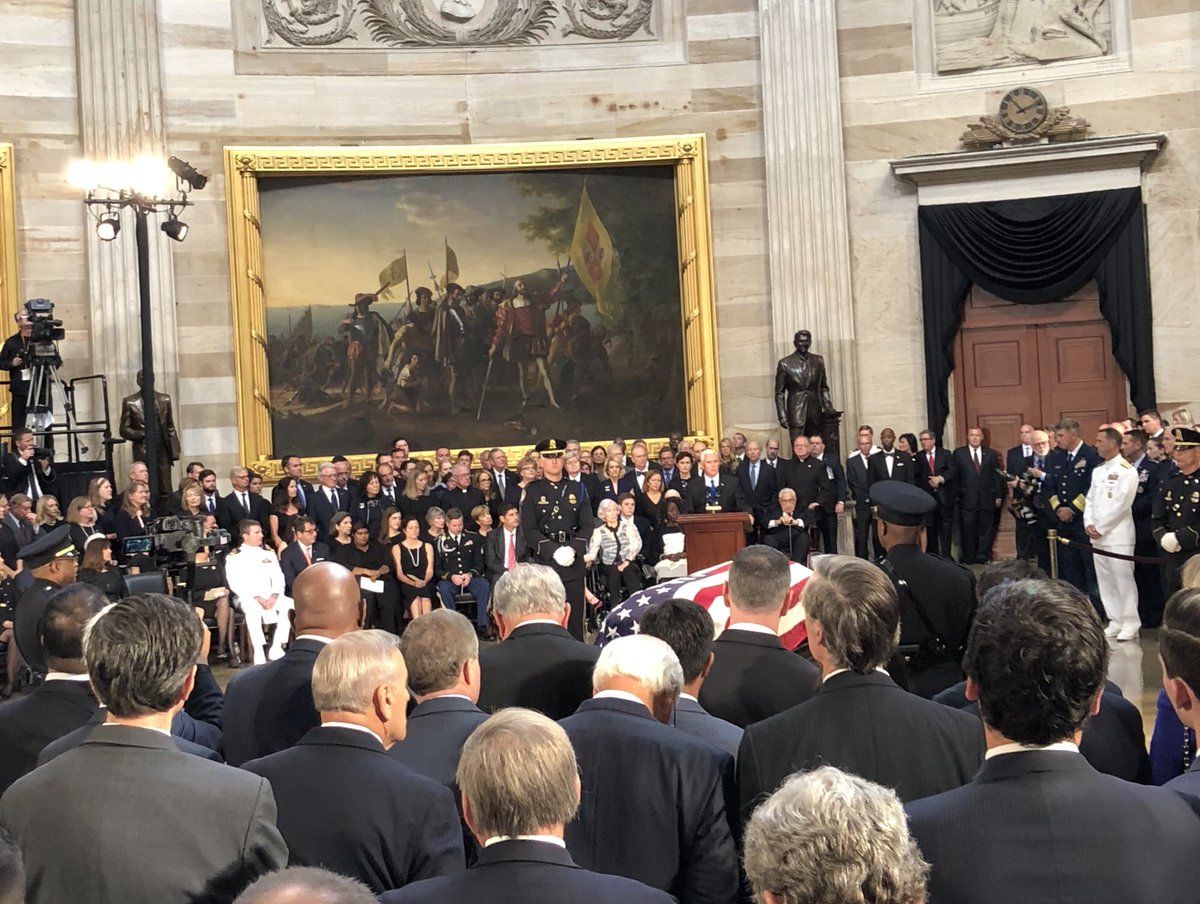 Mike Pence speaks in front of Senator John McCain's casket in the Capitol Rotunda. (WTOP/Chris Cioffi)