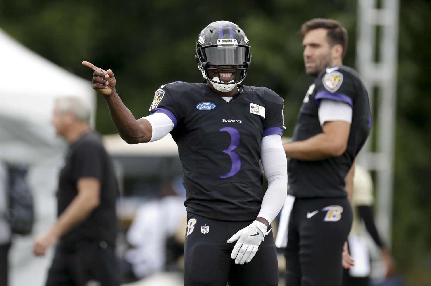 Baltimore Ravens quarterback Robert Griffin III (3) laughs during a joint practice with the at the Indianapolis Colts NFL football training camp in Westfield, Ind., Friday, Aug. 17, 2018. (AP Photo/Michael Conroy)