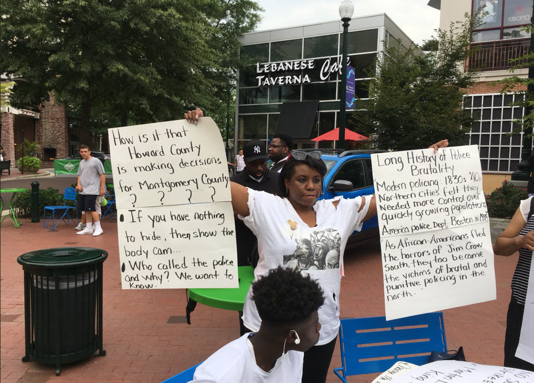 Rally-goers and organizers on Sunday, Aug. 5, 2018, expressed concern about what led up to the fatal encounter between Robert Lawrence White, who was unarmed, and a Montgomery County police officer. (WTOP/Liz Anderson)