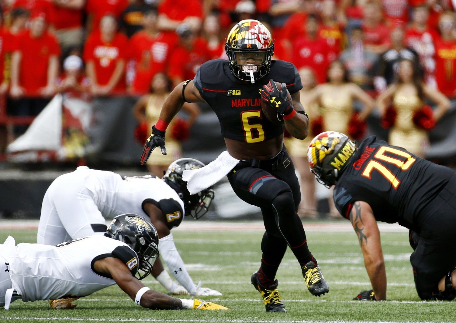 FILE - In this Sept. 9, 2017, file photo, Maryland running back Ty Johnson (6) rushes for a touchdown in the first half of an NCAA college football game against Towson in College Park, Md. One of the big early-season surprises so far has been Maryland’s ability to run. Through three weeks, the Terrapins are No. 3 in the Big Ten at 224 yards per game. With their top two quarterbacks out for the season, it’s a pretty good bet they’ll run even more this week. The problem in this week's game: Minnesota has the league’s best rushing defense. (AP Photo/Patrick Semansky, File)
