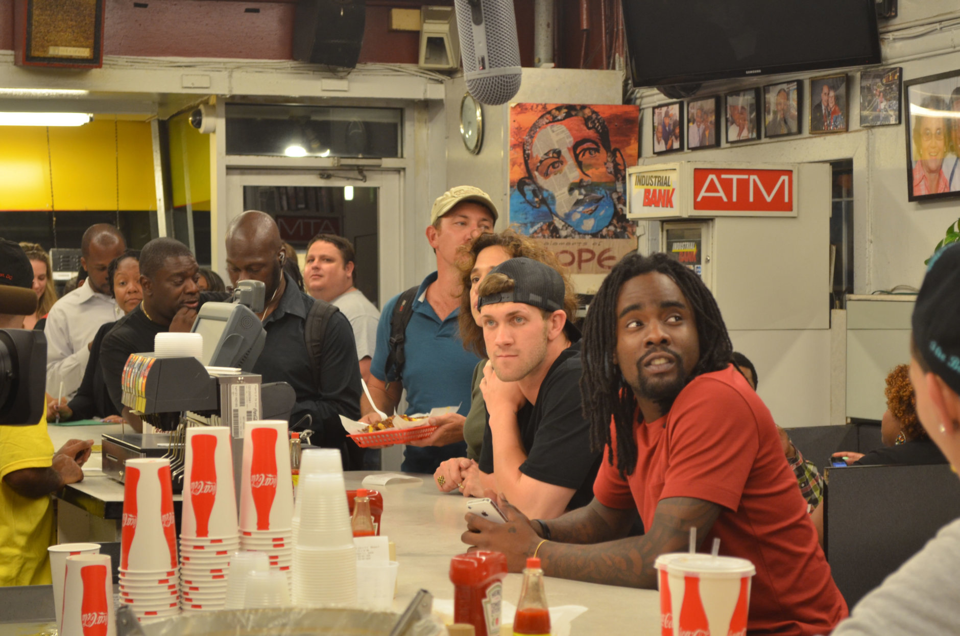 The full D.C.: Bryce Harper and Wale at Ben's. (Courtesy of Ben's Chili Bowl)