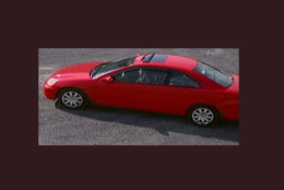 photo shows a red car
