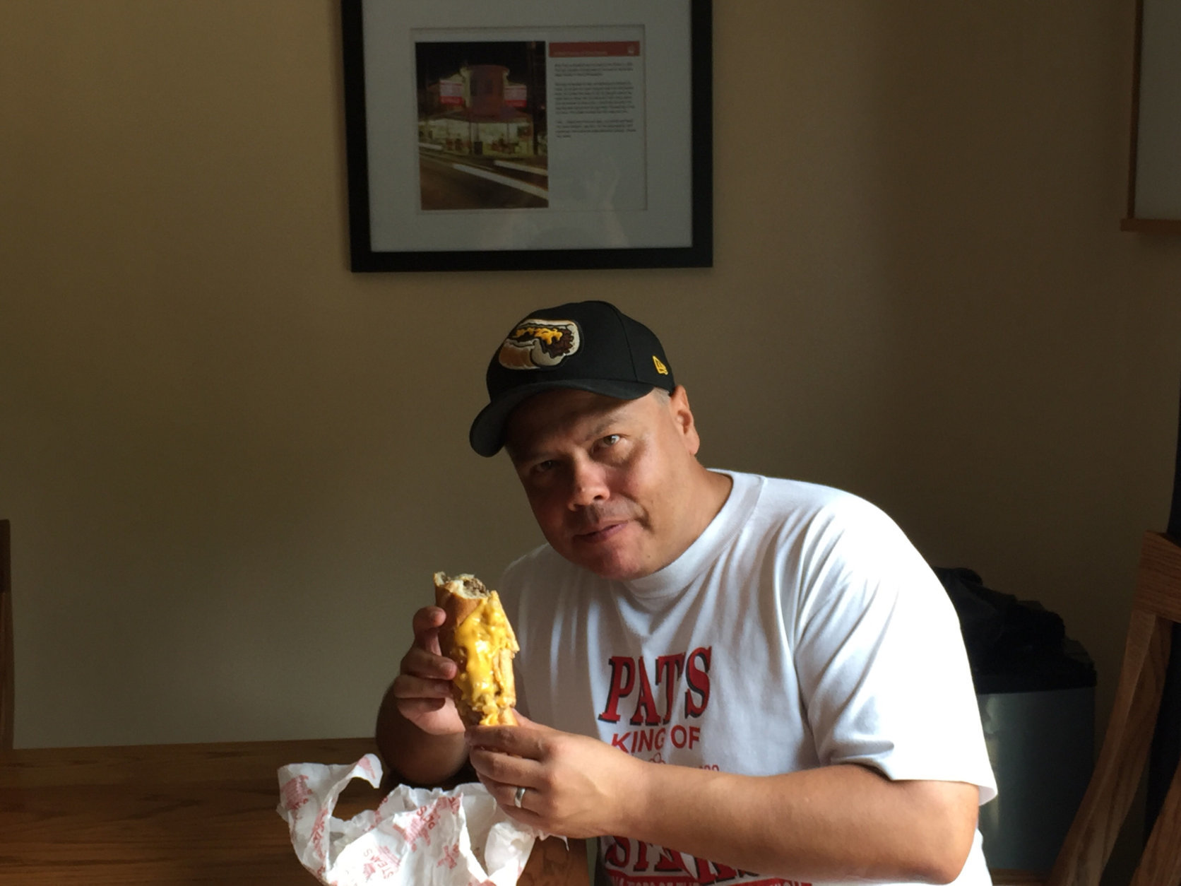 "I have to be honest," said editor Mike Jakaitis after taking his first bite, "for a cheesesteak to come through the mail and you put it in the oven, it tastes pretty darn good!" (WTOP/Mike Jakaitis)