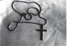 Cross necklaces given to victims by Pittsburgh diocese priests marked them for other predators in the church. (Courtesy Pennsylvania attorney general)