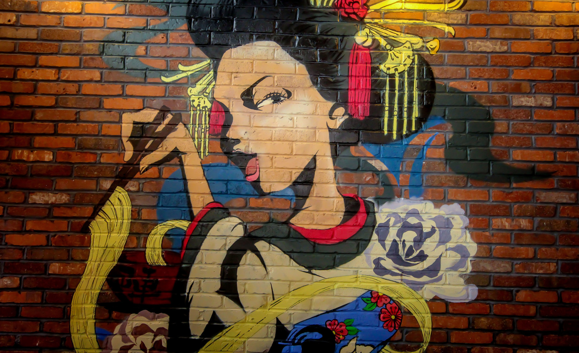 A geisha mural on one of the walls of the new JINYA Ramen Bar. (Courtesy Pike & Rose)