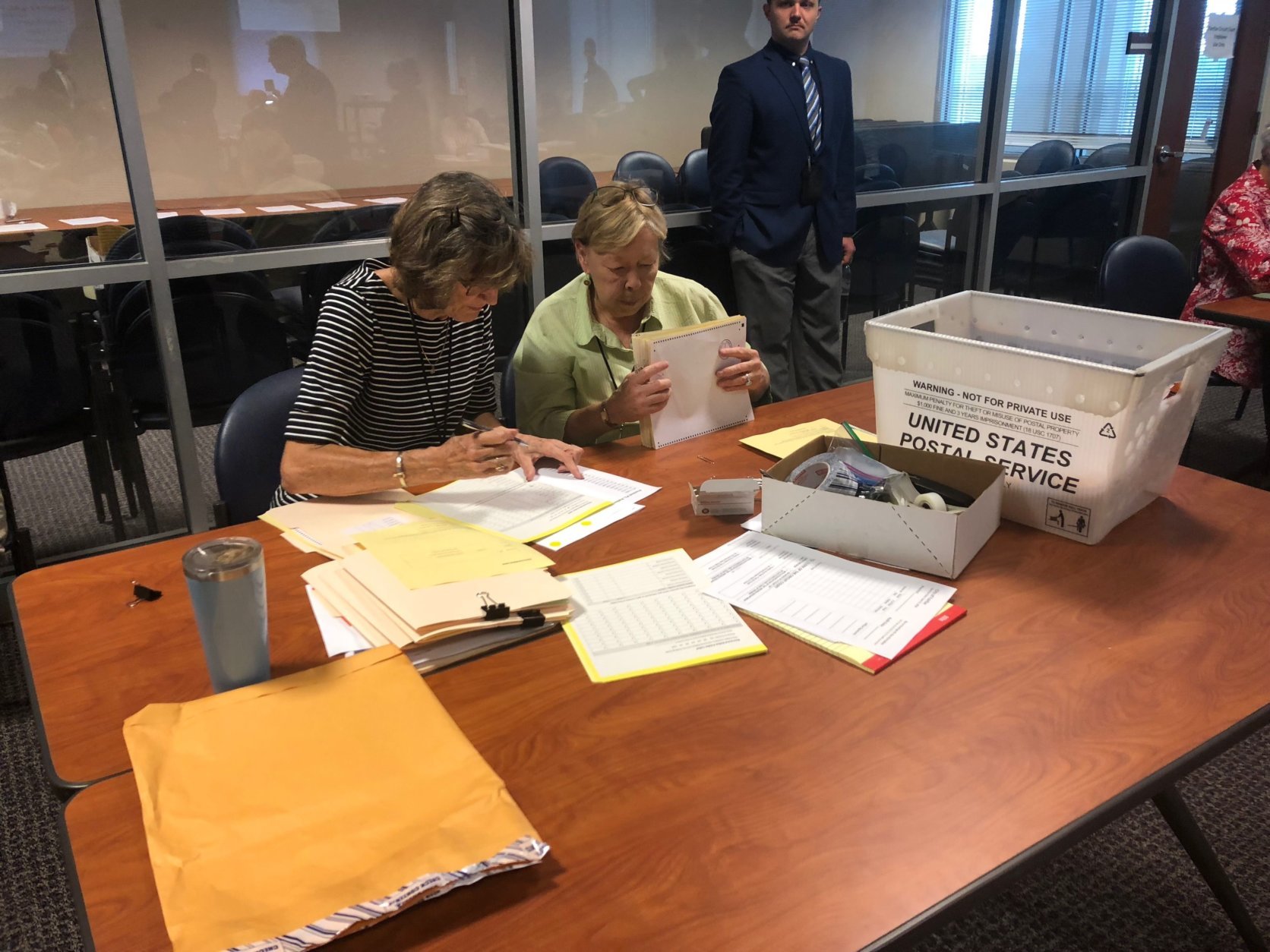In a first for Virginia, elections officials gathered Thursday and Friday at the Fairfax County Courthouse to prove that election results from June’s primary were correct. (WTOP/Max Smith)