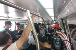 Reporters have slid into a car that was kept private for people headed to the Unite The Right 2 rally from the Vienna Metro station.  (WTOP/Max Smith)