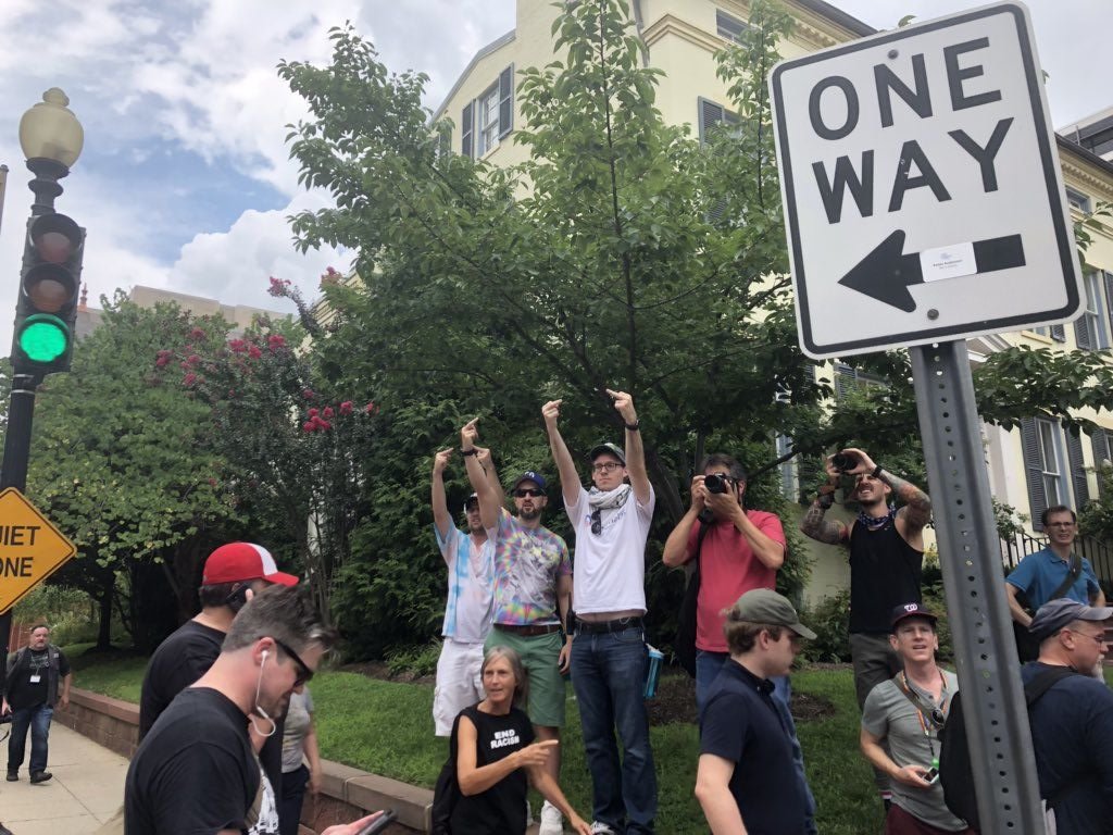 Counterprotesters are walking in front of the group of Unite The Right 2 protesters. There are lots of D.C. Police present. (WTOP/Max Smith)