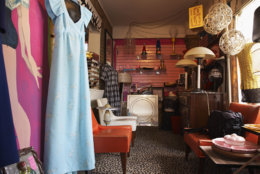 Clothing and Furniture in Crowded Second Hand Store