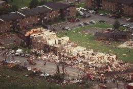 An apartment building in Crest Hill, Ill., is shown Aug. 28, 1990, after being destroyed by a tornado.  The American Midwest is home to more tornadoes than any place on Earth, earning the moniker "Tornado Alley." Illinois is one of the most "tornadically active" states in the country according to Greg Simunich of Omni Weather Inc,. in West Chicago, Ill., with Kansas, Oklahoma and Texas taking top honors. (AP Photo/Mark Elias, File)