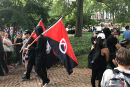 Various groups and people include clergy, religious groups, people from Black Lives Matter converge in Charlottesville, Virginia, for the one-year mark of the deadly clash between white nationalists and counterprotesters. (WTOP/Max Smith)