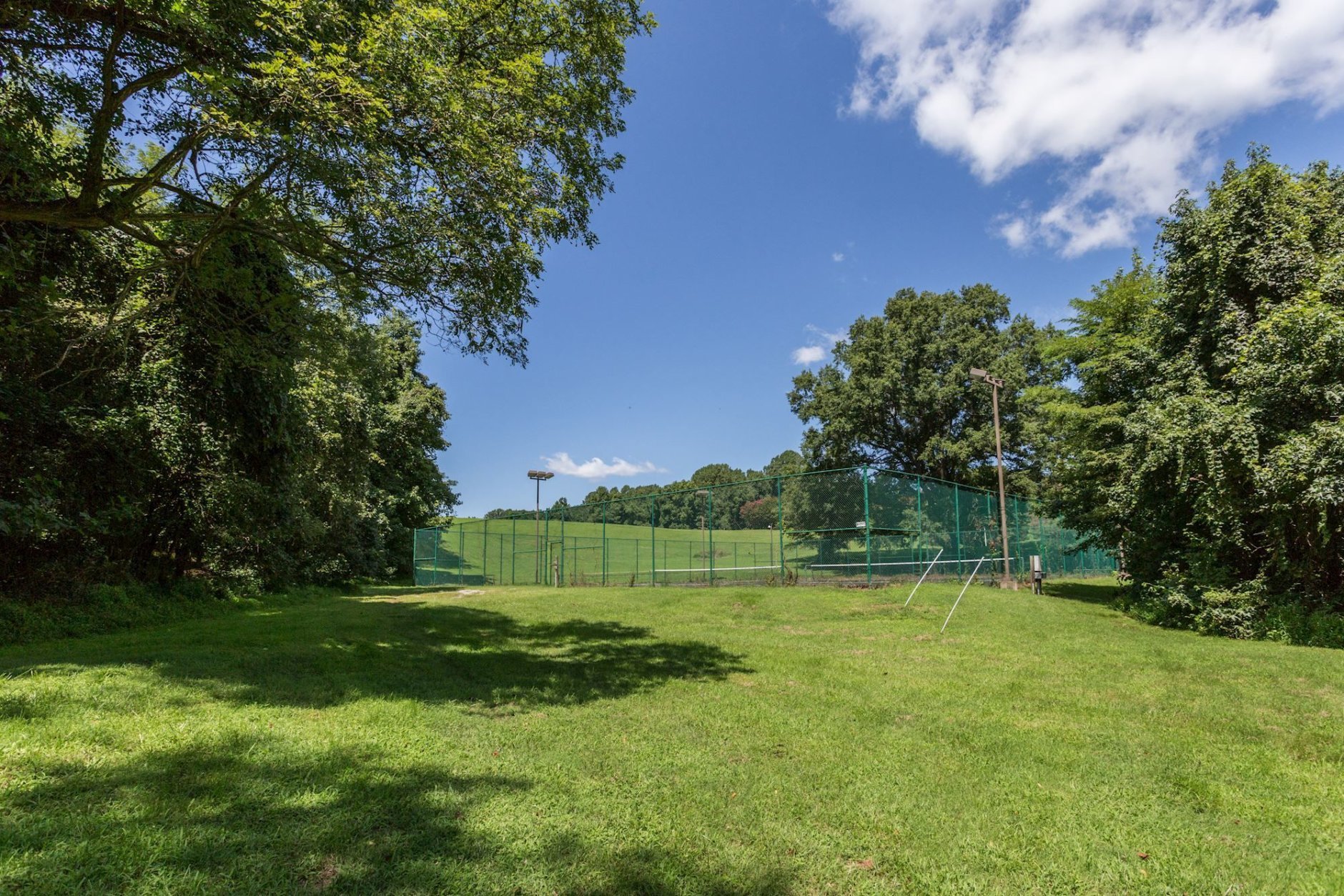 The tennis courts of Tom Clancy's estate. (Courtesy Cummings & Co. Realtors)