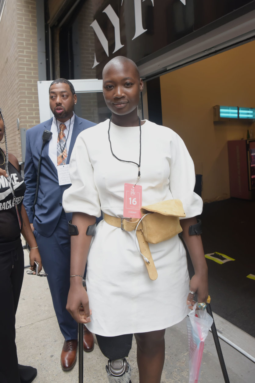 Mama Cax, an amputee and activist for body acceptance, heads backstage to prepare for her walk down the runway at the CHROMAT show at New York Fashion Week. (Courtesy Shannon Finney/<a href="https://www.shannonfinneyphotography.com/index" target="_blank" rel="noopener noreferrer">shannonfinneyphotography.com</a>)