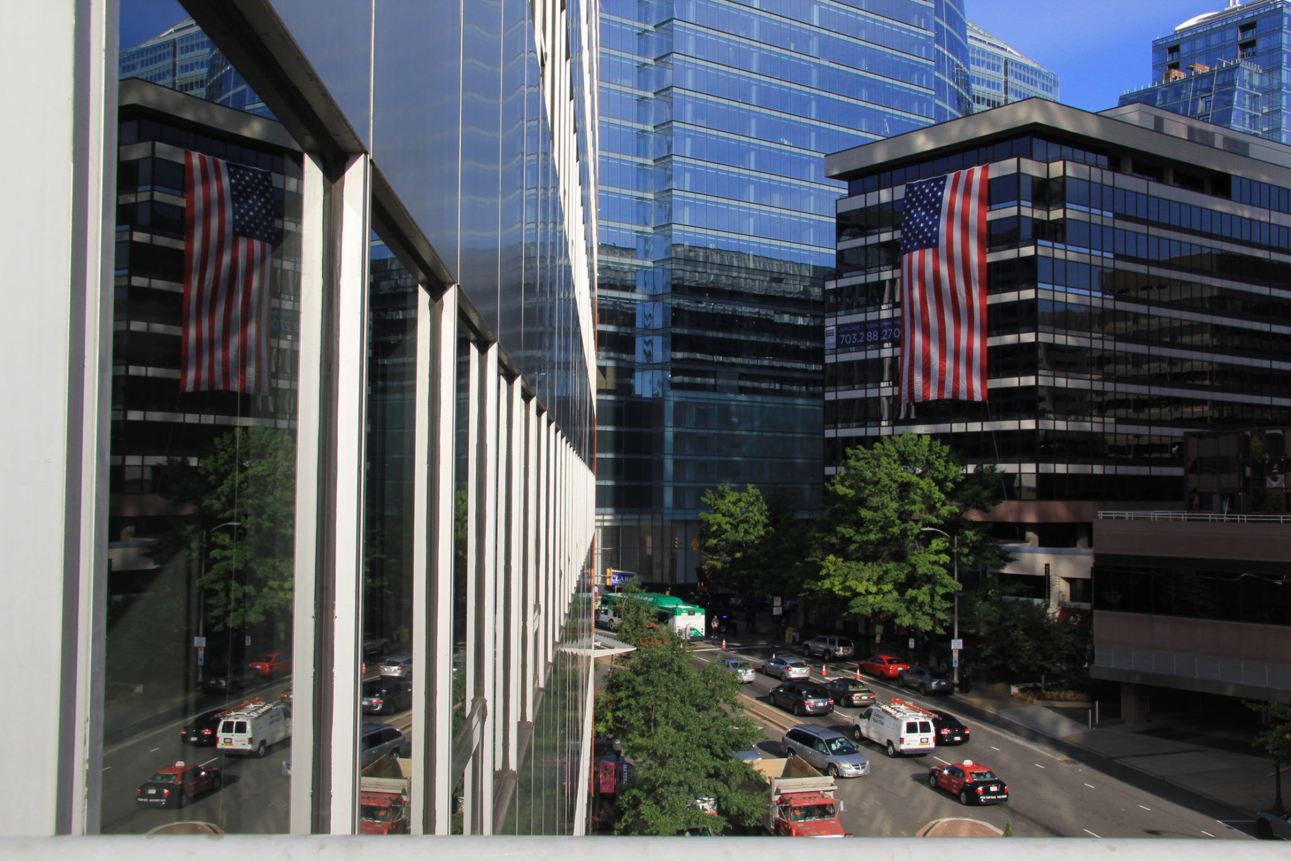 American flags hang from the tops of buildings in a show of patriotism and remembrance. (Courtesy Rosslyn Business Improvement District)