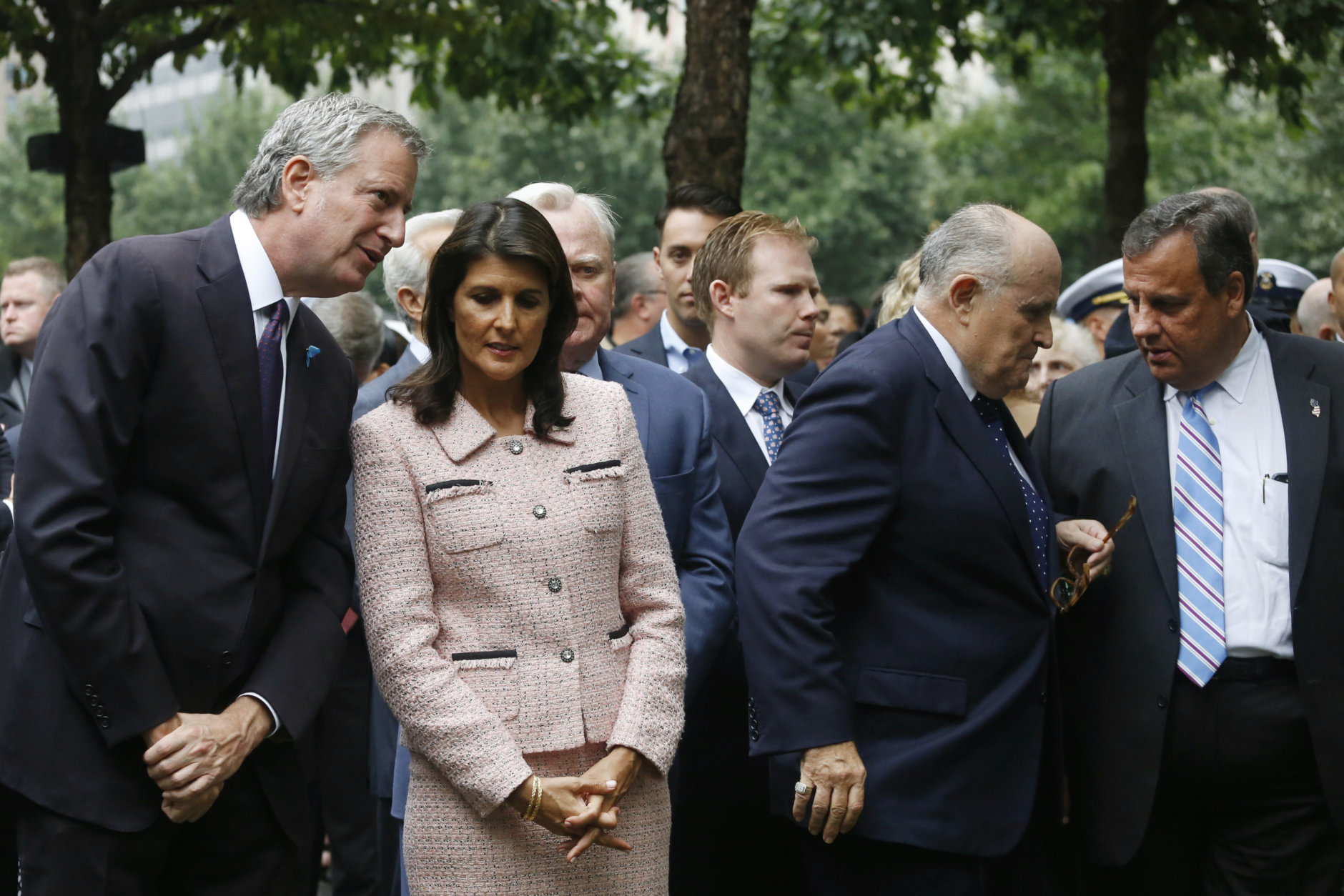 Attending a ceremony marking the 17th anniversary of the terrorist attacks on the United States are, left to right: New York Mayor Bill de Blasio, Nikki Haley, the U.S. Ambassador to the United Nations, Rudy Giuliani, lawyer for President Donald Trump and former mayor of New York, and Chris Christie, former governor of New Jersey, Tuesday, Sept. 11, 2018, in New York. (AP Photo/Mark Lennihan)