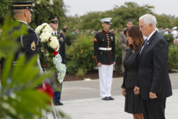 Vice President Mike Pence and his wife Karen Pence, lower their heads after laying a wreath during the September 11th Pentagon Memorial Observance at the Pentagon on the 17th anniversary of the September 11th attacks, Tuesday, Sept. 11, 2018. (AP Photo/Pablo Martinez Monsivais)