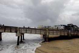 Heavy surf washes under Jennette's Pier in Nags Head, N.C., Thursday, Sept. 13, 2018 as Hurricane Florence approaches the east coast. (AP Photo/Gerry Broome)