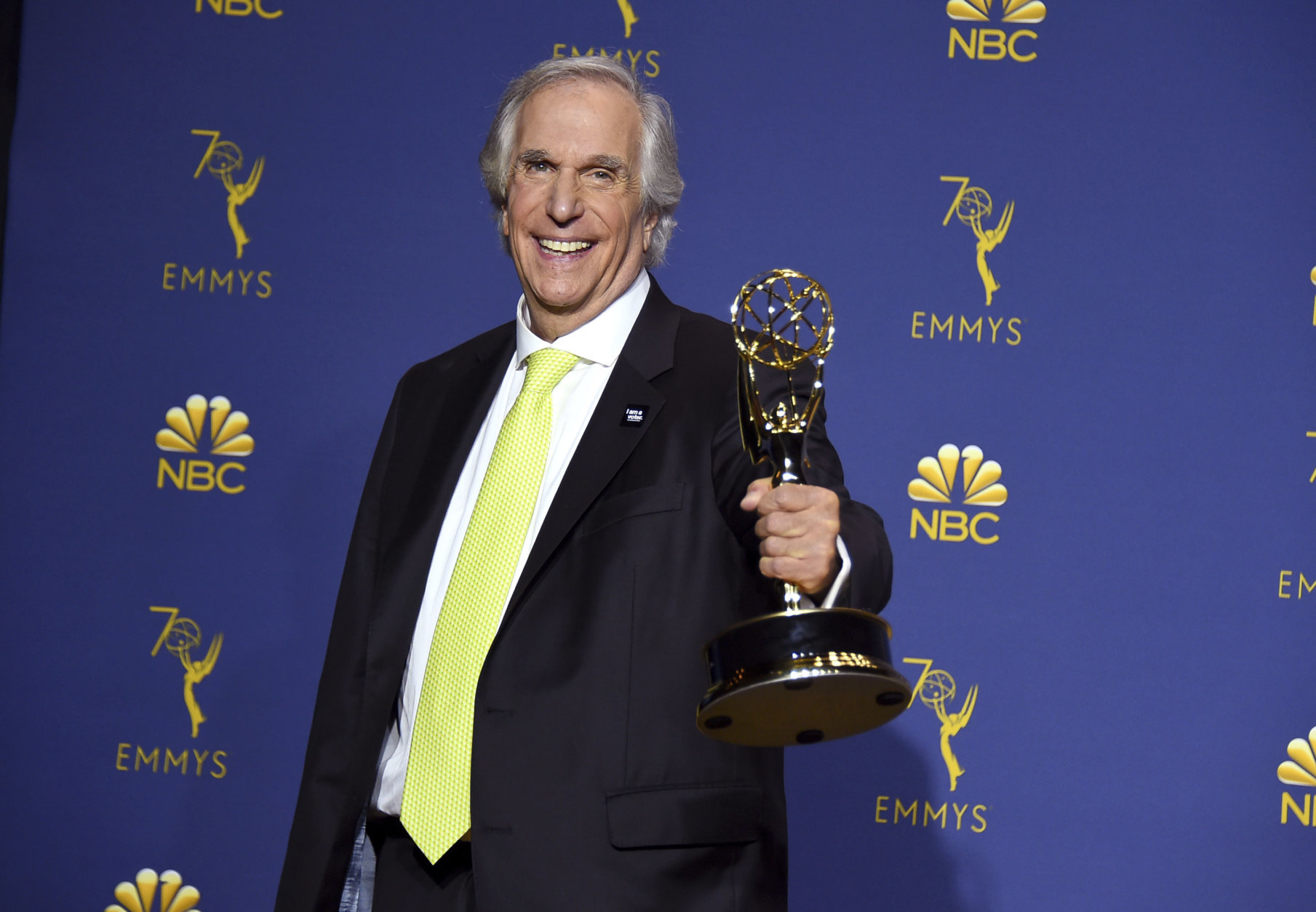 Henry Winkler poses in the press room with the award for outstanding supporting actor in a comedy series for "Barry" at the 70th Primetime Emmy Awards on Monday, Sept. 17, 2018, at the Microsoft Theater in Los Angeles. (Photo by Jordan Strauss/Invision/AP)