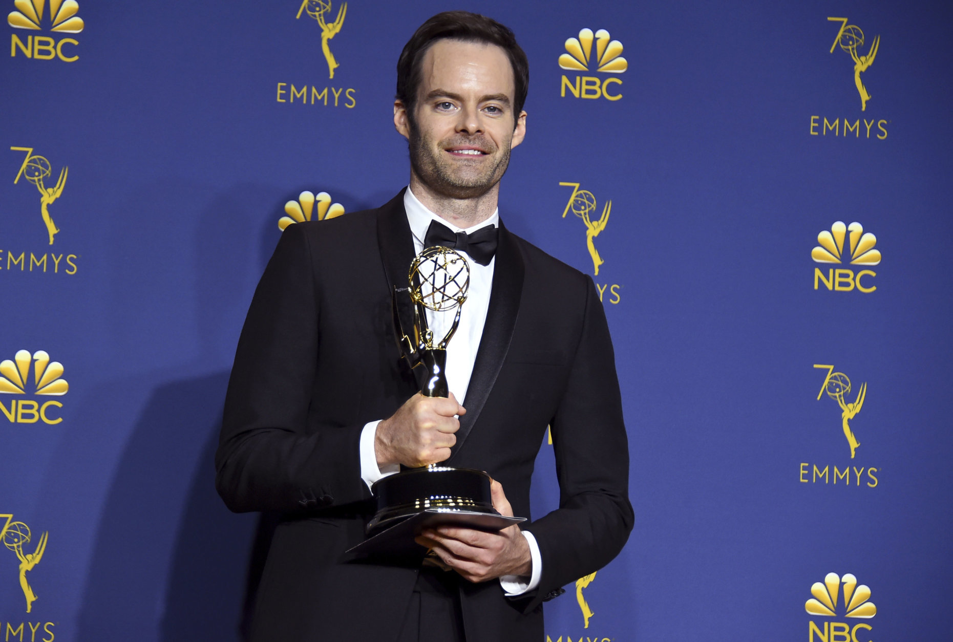 Bill Hader poses in the press room with the award for outstanding lead actor in a comedy series for "Barry" at the 70th Primetime Emmy Awards on Monday, Sept. 17, 2018, at the Microsoft Theater in Los Angeles. (Photo by Jordan Strauss/Invision/AP)